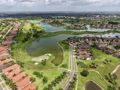 Nestled within the sought-after Aberdeen Golf & Country Club on Aberdeen Golf and Country Club in Florida - for sale on GolfHomes.com, golf home, golf lot