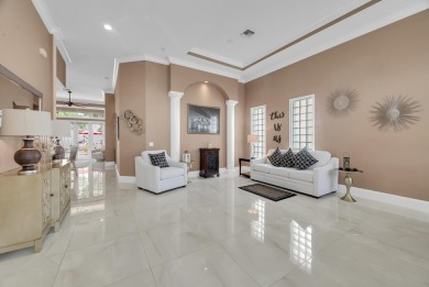 Nestled within the sought-after Aberdeen Golf & Country Club on Aberdeen Golf and Country Club in Florida - for sale on GolfHomes.com, golf home, golf lot