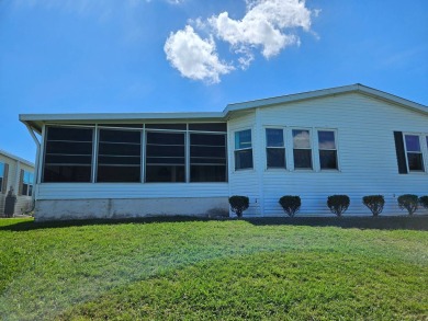 This home is on leased land and is located in a 55+ resort-style on Big Cypress Golf and Country Club in Florida - for sale on GolfHomes.com, golf home, golf lot