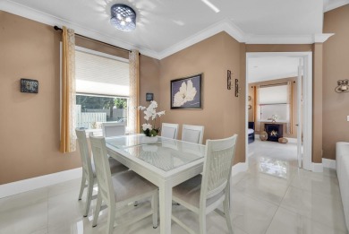 Nestled within the sought-after Aberdeen Golf & Country Club on Aberdeen Golf and Country Club in Florida - for sale on GolfHomes.com, golf home, golf lot