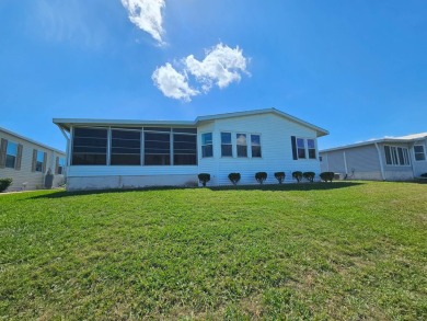 This home is on leased land and is located in a 55+ resort-style on Big Cypress Golf and Country Club in Florida - for sale on GolfHomes.com, golf home, golf lot