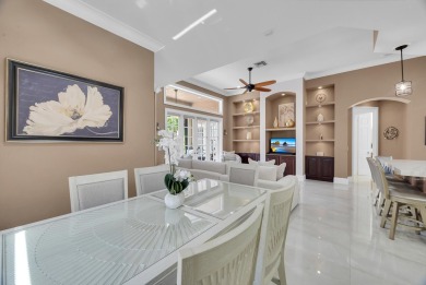Nestled within the sought-after Aberdeen Golf & Country Club on Aberdeen Golf and Country Club in Florida - for sale on GolfHomes.com, golf home, golf lot