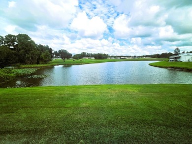This home is on leased land and is located in a 55+ resort-style on Big Cypress Golf and Country Club in Florida - for sale on GolfHomes.com, golf home, golf lot