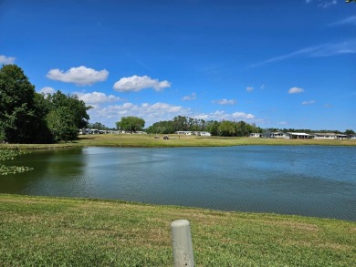 This home is on leased land and is located in a 55+ resort-style on Big Cypress Golf and Country Club in Florida - for sale on GolfHomes.com, golf home, golf lot