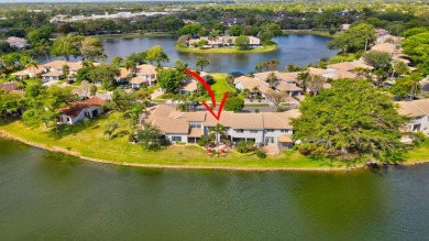Check out this stunning lakefront 3-bed, 2.5-bath townhome in on Deer Creek Golf Club in Florida - for sale on GolfHomes.com, golf home, golf lot