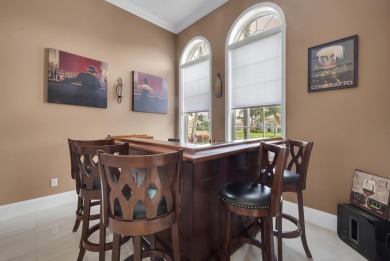 Nestled within the sought-after Aberdeen Golf & Country Club on Aberdeen Golf and Country Club in Florida - for sale on GolfHomes.com, golf home, golf lot