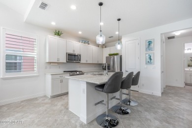 Beautiful Bamboo Cottage available now in Latitude on LPGA International Golf Course in Florida - for sale on GolfHomes.com, golf home, golf lot