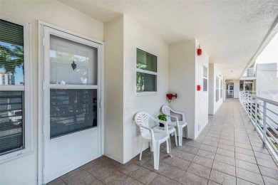 Under contract-accepting backup offers. Imagine waking up to on Isla Del Sol Yacht and Country Club in Florida - for sale on GolfHomes.com, golf home, golf lot
