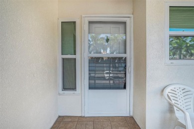 Under contract-accepting backup offers. Imagine waking up to on Isla Del Sol Yacht and Country Club in Florida - for sale on GolfHomes.com, golf home, golf lot