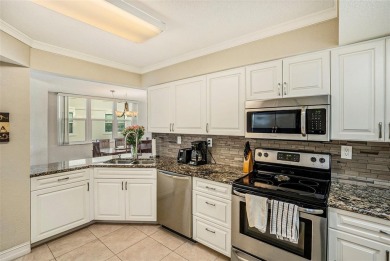 Under contract-accepting backup offers. Imagine waking up to on Isla Del Sol Yacht and Country Club in Florida - for sale on GolfHomes.com, golf home, golf lot