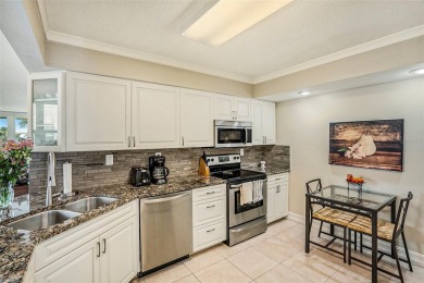 Under contract-accepting backup offers. Imagine waking up to on Isla Del Sol Yacht and Country Club in Florida - for sale on GolfHomes.com, golf home, golf lot