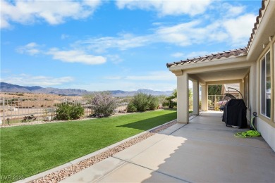 This single-level 3-bedroom, 2.5-bathroom home with a den, built on Wolf Creek At Paradise Canyon in Nevada - for sale on GolfHomes.com, golf home, golf lot