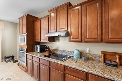 This single-level 3-bedroom, 2.5-bathroom home with a den, built on Wolf Creek At Paradise Canyon in Nevada - for sale on GolfHomes.com, golf home, golf lot
