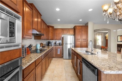 This single-level 3-bedroom, 2.5-bathroom home with a den, built on Wolf Creek At Paradise Canyon in Nevada - for sale on GolfHomes.com, golf home, golf lot