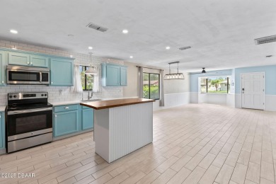 House did not flood during the last storm, this property is one on Daytona Beach Golf Club in Florida - for sale on GolfHomes.com, golf home, golf lot