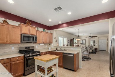 This beautifully maintained 3-bedroom, 2-bath home with a 2.5 on Poston Butte Golf Club in Arizona - for sale on GolfHomes.com, golf home, golf lot