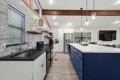 AMAZING LAKE PROPERTY WITH BOAT SLIP! LAKE TEXOMA WATERFRONT on Tanglewood Resort in Texas - for sale on GolfHomes.com, golf home, golf lot