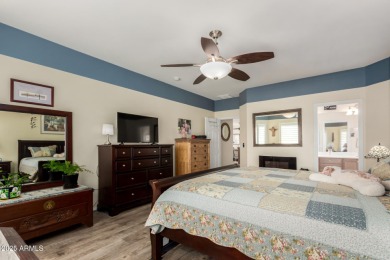 This beautifully maintained 3-bedroom, 2-bath home with a 2.5 on Poston Butte Golf Club in Arizona - for sale on GolfHomes.com, golf home, golf lot