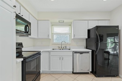 Very charming Classic Florida Coastal Ranch home with 3 bedrooms on Palm Harbor Golf Club in Florida - for sale on GolfHomes.com, golf home, golf lot