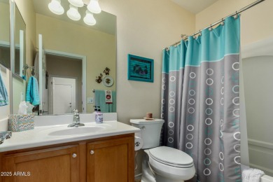 This beautifully maintained 3-bedroom, 2-bath home with a 2.5 on Poston Butte Golf Club in Arizona - for sale on GolfHomes.com, golf home, golf lot