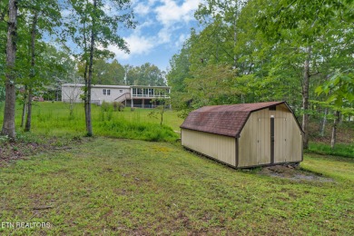 Three bedroom manufactured home with lake frontage on Lake on Lake Tansi Village Country Club in Tennessee - for sale on GolfHomes.com, golf home, golf lot