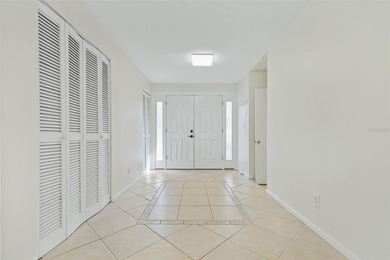 Very charming Classic Florida Coastal Ranch home with 3 bedrooms on Palm Harbor Golf Club in Florida - for sale on GolfHomes.com, golf home, golf lot