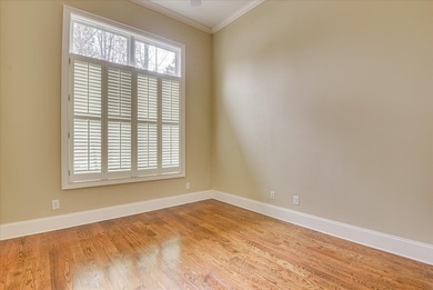 This immaculate two-bedroom townhome in Woodside offers on Woodside Plantation Country Club in South Carolina - for sale on GolfHomes.com, golf home, golf lot