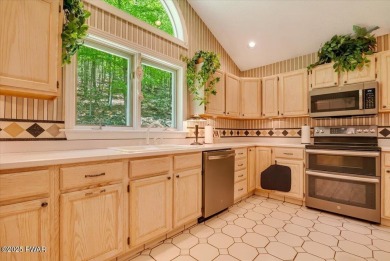 SECLUDED PARADISE in desirable golf community of Tanglwood Lakes on Paupack Hills Golf and Country Club in Pennsylvania - for sale on GolfHomes.com, golf home, golf lot