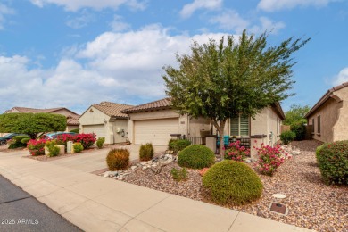 This beautifully maintained 3-bedroom, 2-bath home with a 2.5 on Poston Butte Golf Club in Arizona - for sale on GolfHomes.com, golf home, golf lot