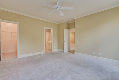 This immaculate two-bedroom townhome in Woodside offers on Woodside Plantation Country Club in South Carolina - for sale on GolfHomes.com, golf home, golf lot