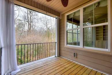 This immaculate two-bedroom townhome in Woodside offers on Woodside Plantation Country Club in South Carolina - for sale on GolfHomes.com, golf home, golf lot