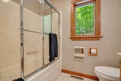 SECLUDED PARADISE in desirable golf community of Tanglwood Lakes on Paupack Hills Golf and Country Club in Pennsylvania - for sale on GolfHomes.com, golf home, golf lot