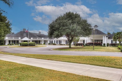 This immaculate two-bedroom townhome in Woodside offers on Woodside Plantation Country Club in South Carolina - for sale on GolfHomes.com, golf home, golf lot