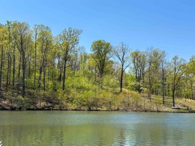 Lakefront lot on the peaceful shores of Lake Aztec in Cherokee on Cherokee Village South Course in Arkansas - for sale on GolfHomes.com, golf home, golf lot