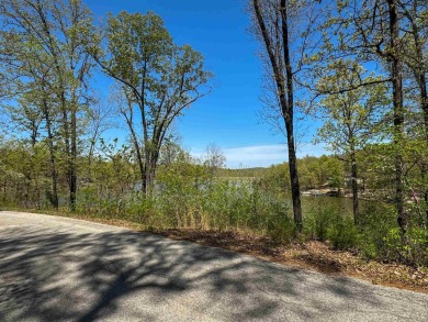Lakefront lot on the peaceful shores of Lake Aztec in Cherokee on Cherokee Village South Course in Arkansas - for sale on GolfHomes.com, golf home, golf lot