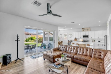 Step into timeless elegance in this stunning 2021 Craftsman home on Verrado Golf Club - Victory in Arizona - for sale on GolfHomes.com, golf home, golf lot