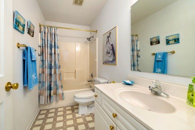 Beautiful patio home w/ a boat slip & view of the #17 green of on Players Course At Wyboo Plantation in South Carolina - for sale on GolfHomes.com, golf home, golf lot