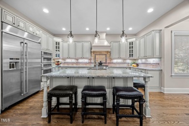 This spacious 6,785 square foot home with 5 bedrooms, 5 full on Hasentree Club in North Carolina - for sale on GolfHomes.com, golf home, golf lot