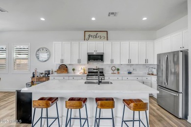Step into timeless elegance in this stunning 2021 Craftsman home on Verrado Golf Club - Victory in Arizona - for sale on GolfHomes.com, golf home, golf lot