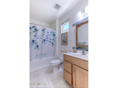 Nestled in the beautiful gated community of Quail Creek you will on Quail Creek Country Club  in Arizona - for sale on GolfHomes.com, golf home, golf lot