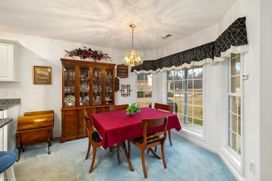 Beautiful patio home w/ a boat slip & view of the #17 green of on Players Course At Wyboo Plantation in South Carolina - for sale on GolfHomes.com, golf home, golf lot