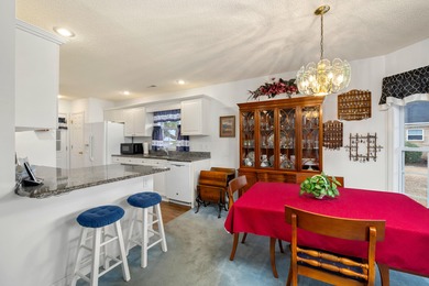 Beautiful patio home w/ a boat slip & view of the #17 green of on Players Course At Wyboo Plantation in South Carolina - for sale on GolfHomes.com, golf home, golf lot