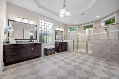 This spacious 6,785 square foot home with 5 bedrooms, 5 full on Hasentree Club in North Carolina - for sale on GolfHomes.com, golf home, golf lot