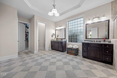 This spacious 6,785 square foot home with 5 bedrooms, 5 full on Hasentree Club in North Carolina - for sale on GolfHomes.com, golf home, golf lot