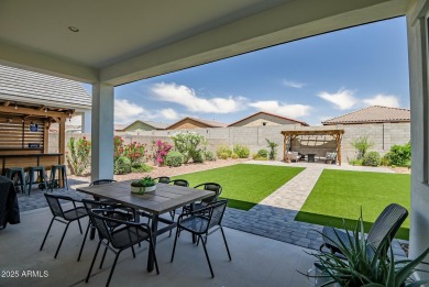 Step into timeless elegance in this stunning 2021 Craftsman home on Verrado Golf Club - Victory in Arizona - for sale on GolfHomes.com, golf home, golf lot