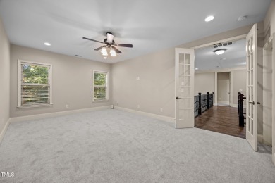 This spacious 6,785 square foot home with 5 bedrooms, 5 full on Hasentree Club in North Carolina - for sale on GolfHomes.com, golf home, golf lot