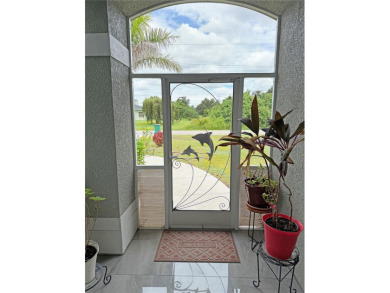 Impressive 4 Bedroom, 3 Bathroom home with attached 3 Car Garage on Deep Creek Golf Club in Florida - for sale on GolfHomes.com, golf home, golf lot