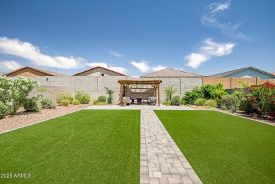 Step into timeless elegance in this stunning 2021 Craftsman home on Verrado Golf Club - Victory in Arizona - for sale on GolfHomes.com, golf home, golf lot