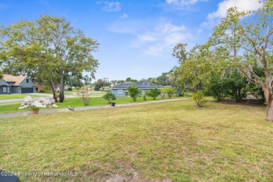 Your Dream Home Awaits: Modern Comforts in a Prime Location on Seven Hills Golfers Club in Florida - for sale on GolfHomes.com, golf home, golf lot