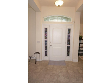 Impressive 4 Bedroom, 3 Bathroom home with attached 3 Car Garage on Deep Creek Golf Club in Florida - for sale on GolfHomes.com, golf home, golf lot
